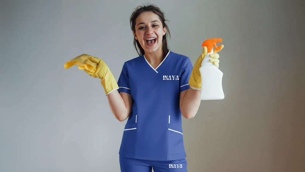 Smiling INAYA maid in uniform