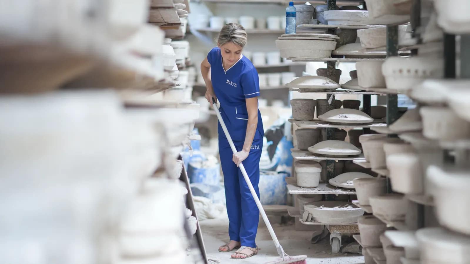 Maid cooking food in Ajman kitchen