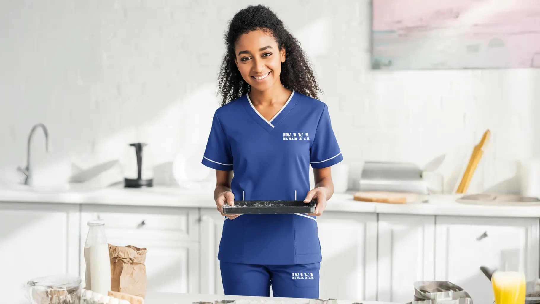 INAYA Domestic Worker vacuuming living room in Ajman